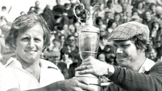Jack Newton and Tom Watson hold up the British Open Golf Championship Trophy after they tied for a playoff to decide which one gets the prize, 1975.