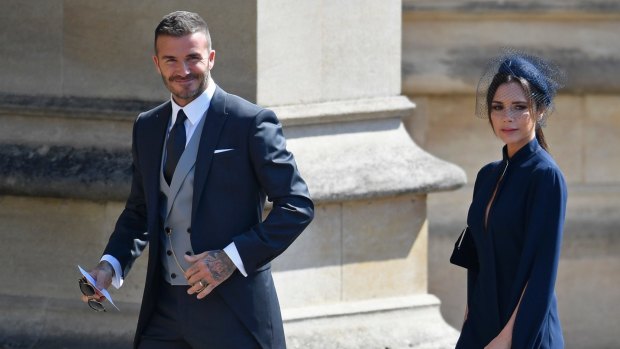 David and Victoria Beckham arrive for the wedding.