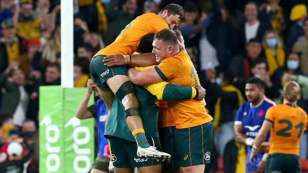 The Wallabies celebrate.