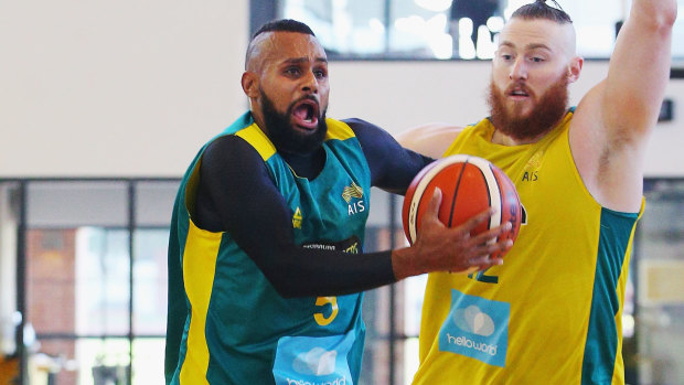 NBA stars Patty Mills and Aron Baynes in Boomers practice.