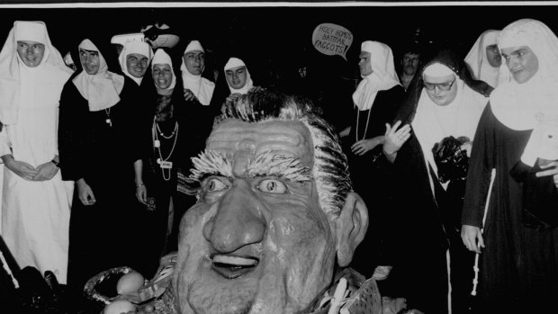 At the 1989 Gay and Lesbian Mardis Gras, the Sisters of Perpetual Indulgence prepare to march with their papier mache Fred Nile head on a platter. 