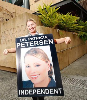 Patricia Petersen previously appeared outside Ipswich Courthouse wearing billboard signs in protest over council fines relating to electoral signs.