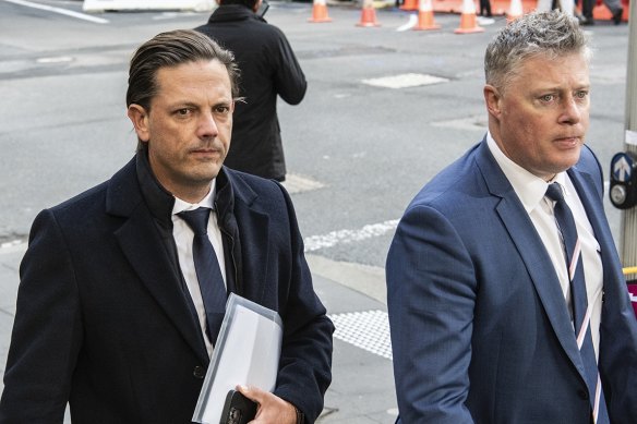 Brett Henson (left) arrives at court on Monday with his lawyer Paul McGirr.