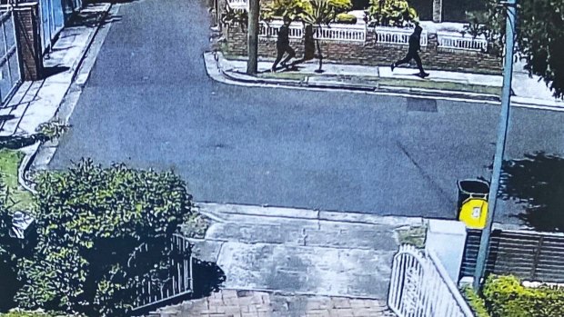 CCTV shows two men running down Chandler Street, Rockdale, shortly after Mick Hawi was shot outside the Fitness First gym. 