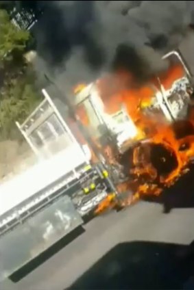 The Izuzu truck burst into flames buts its driver escaped injury. 