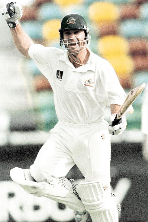 Slater celebrates his century in the fifth Test against England in 1998.