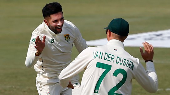 Keshav Maharaj, back, is just the second South African Test cricketer to take a hat-trick.
