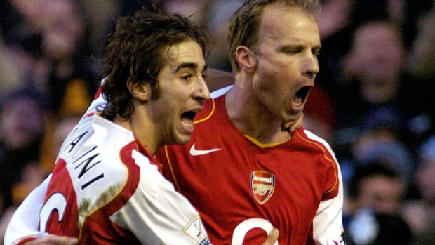 Glory days: Mathieu Flamini, left, and Dennis Bergkamp at Arsenal.