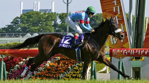 Almond Eye, ridden by Christophe Lemaire, wins the Victoria Mile turf race in Tokyo in May, 2020.