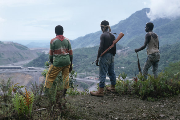 Separatists stand over the Panguna mine.