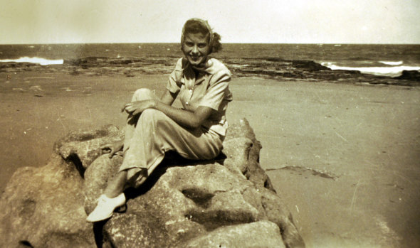 Necia Combe at what is thought to be Cronulla beach relaxing from her duties with the Australian Women's Land Army.