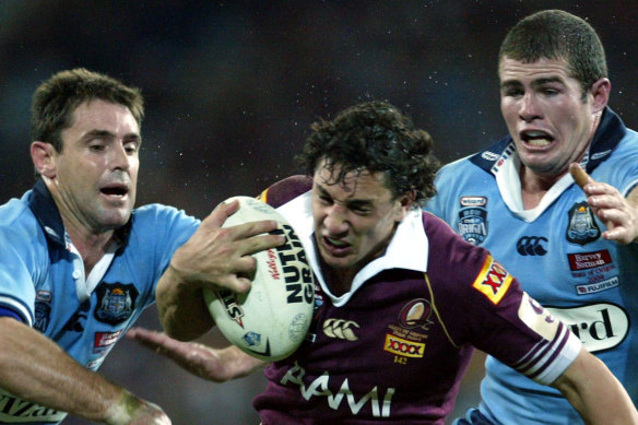 NSW coach Brad Fittler and Billy Slater battle in the 2004 series.