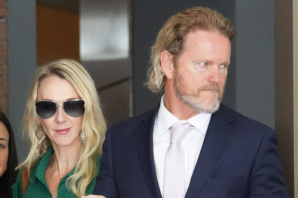 Craig McLachlan and his partner Victoria Scammell leave court on Monday