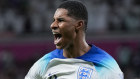 Marcus Rashford celebrates after scoring the opening goal against Wales.