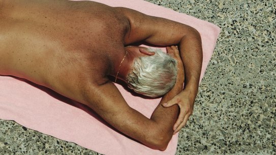 What not to do: researchers are pushing for people to wear hats and sunscreen and avoid getting burned to try to reduce Queensland sky-high skin cancer rate.