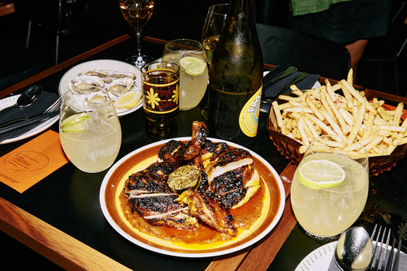 Oysters, fries, and free-range chicken with burnt chili at the Firebird.