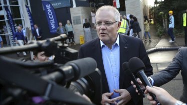 Divine intervention: Re-elected Prime Minister Scott Morrison arrives at the Horizon Church in Sutherland on Sunday.