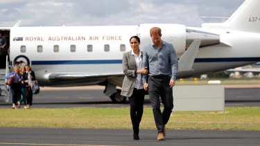 Britain's Prince Harry and Meghan, Duchess of Sussex arrive in Dubbo.