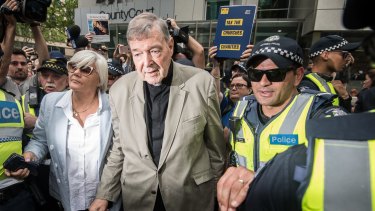 Cardinal George Pell leaving the County Court where was found guilty of child sexual offences.