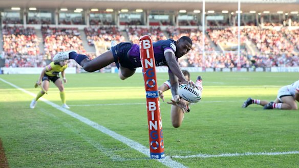 Flying high: Vunivalu gets airborne to score against the Dragons in 2017.