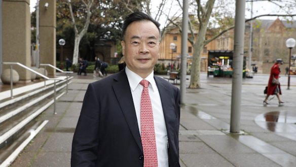 Chau Chak Wing outside the Federal Court in 2018.