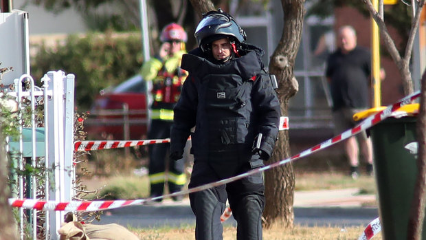 Police bomb squad officers at a property in north Adelaide on Tuesday.
