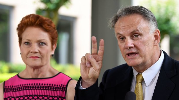 Peace in our times? Mark Latham with One Nation leader Pauline Hanson.