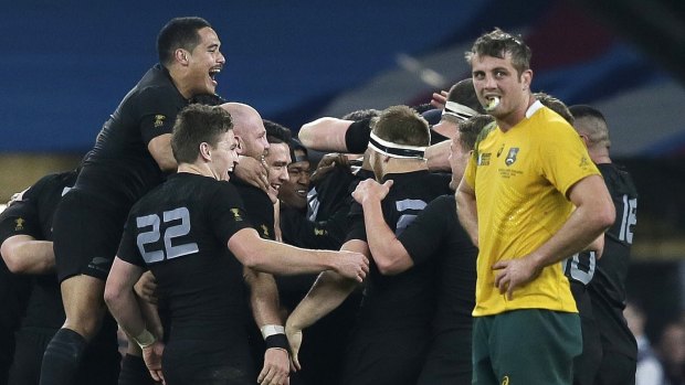 The All Blacks celebrate en route to their second consecutive World Cup title.