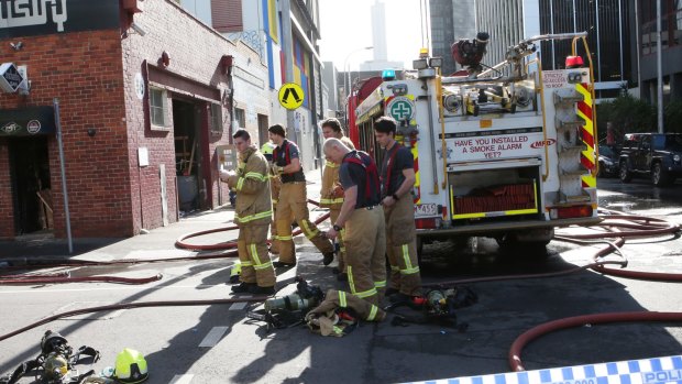 Firefighters attend the Southbank fire.