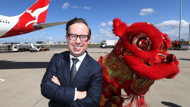 Qantas chief executive Alan Joyce pictured announcing the airline's return to Beijing in 2016. 