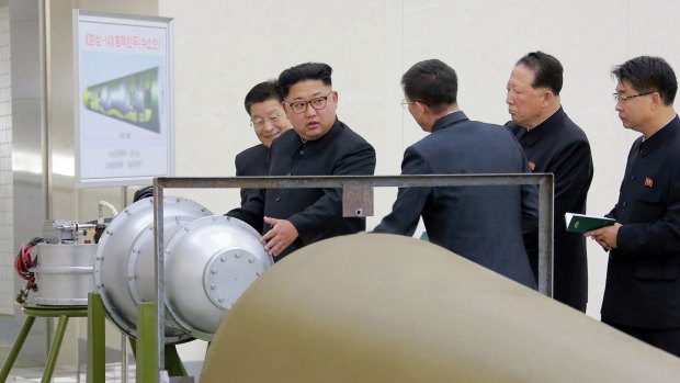 Image distributed on Sunday allegedly of North Korean leader Kim Jong-Un inspecting the loading of a hydrogen bomb into an intercontinental ballistic missile.
