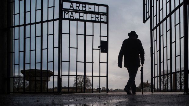 "Arbeit macht frei": The gate of the Sachsenhausen Nazi death camp near Berlin. The slogan was used in other concentration camps as well. 