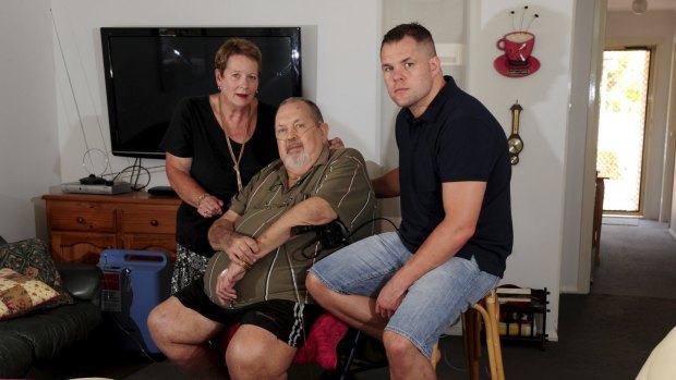 Ben Edwards, with his parents, June and Ray, at their Charnwood home in 2015.
