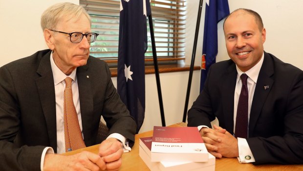 Commissioner Kenneth Hayne delivers his report to Treasurer Josh Frydenberg.