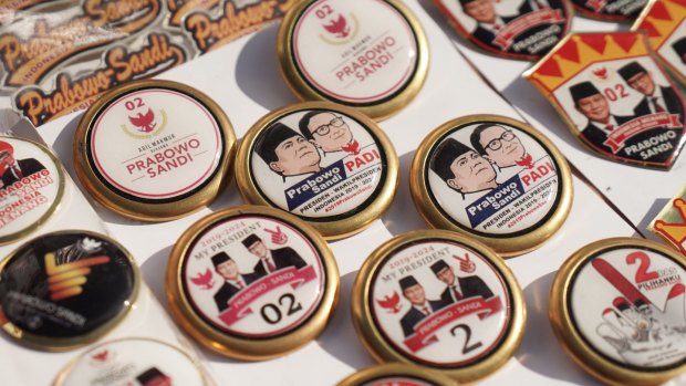 Buttons featuring Prabowo and his running mate Sandiaga "Sandi" Uno at a campaign rally in Karawang, West Java.