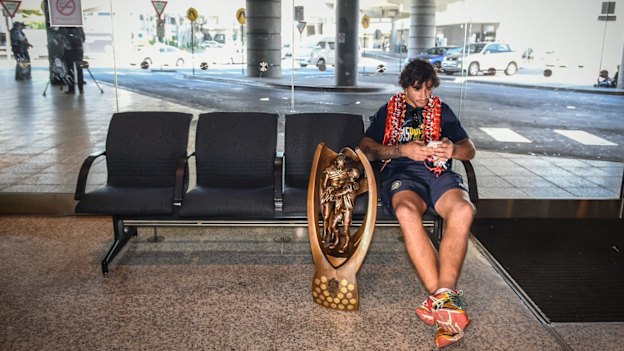 Johnathan Thurston with the trophy after the Cowboys won the NRL Grand Final in 2015.