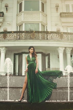  Jacqueline Nguyen outside the family mansion in Ho Chi Minh city in a photoshoot for Vietnamese magazine L'Officiel.