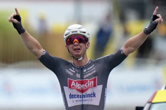 Kaden Groves crosses the finish line to win the twentieth stage of the Tour de France on Saturday.