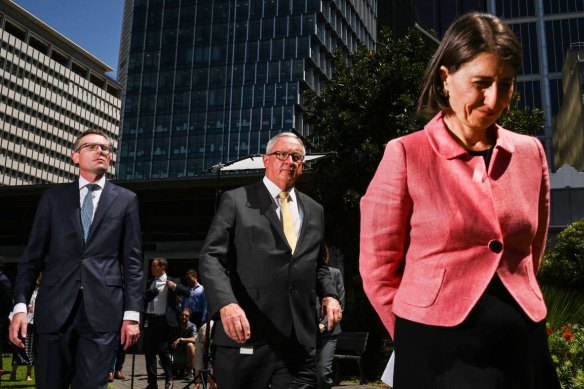 Gladys Berejiklian, Brad Hazzard and Dominic Perrottet front the media last week.
