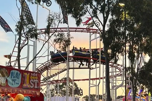 Workers were seen attending to the ride after the incident.