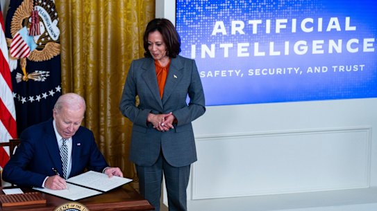 US President Joe Biden, with Vice President Kamala Harris, as he signed the executive order on Monday.