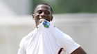 West Indies’ bowler Shamar Joseph bites his jersey during day one of the first cricket Test match.