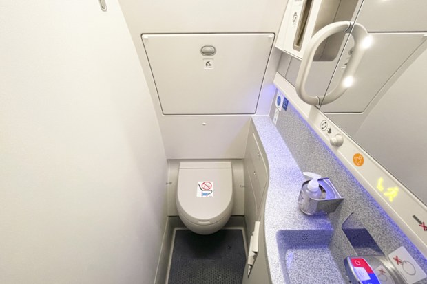 Put your shoes on if you’re going to the plane bathroom, that floor is dirty.