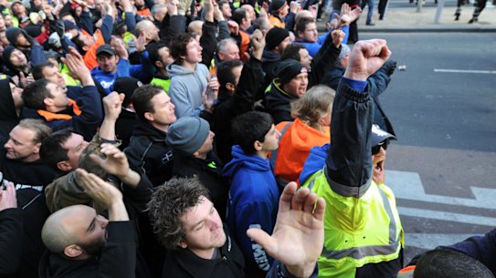 CFMEU workers face off with mounted police during the protests in September 2012.
