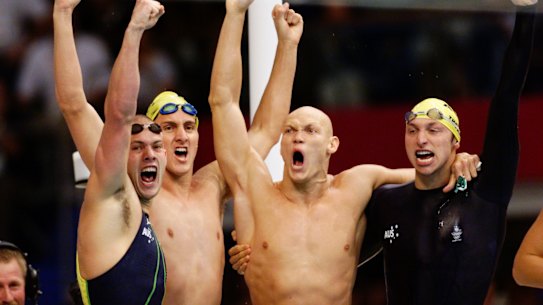 Michael Klim , Ian Thorpe , Chris Fydler and Ashley Callus celeb rate their gold in the 4x100m relay.