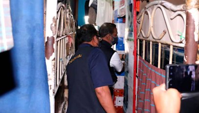 Malaysia Minister of Human Resources M Saravanan inspects a Brightway workers’ dormitory in Selangor state last December. 