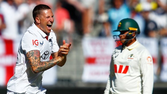 England’s Brydon Carse celebrates the wicket of Australia Usman Khawaja. 