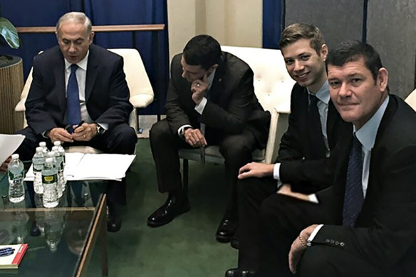 Israeli Prime Minister Benjamin Netanyahu, the PM’s son Yair and James Packer at the United Nations in 2016. Netanyahu has been charged with breach of trust after allegedly accepting gifts, including from James Packer.