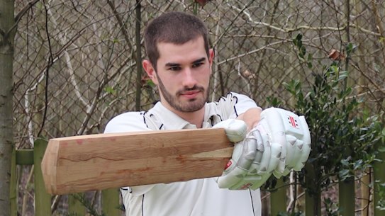 Co-author of the paper Ben Tinkler-Davies tries out a bat made from bamboo.