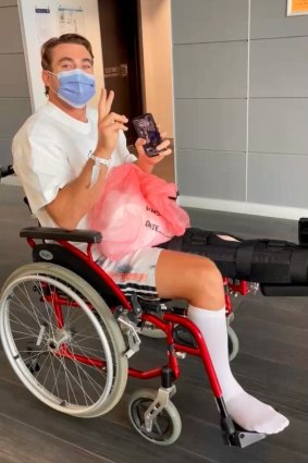 Connor Watson in a wheelchair after surgery on his ruptured patella.